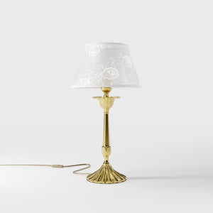Classic brass table lamp with white fabric shade decorated with floral patterns, sculpted base with decorative elements by Ghidini 1849 - Finish: OLV Polished Brass