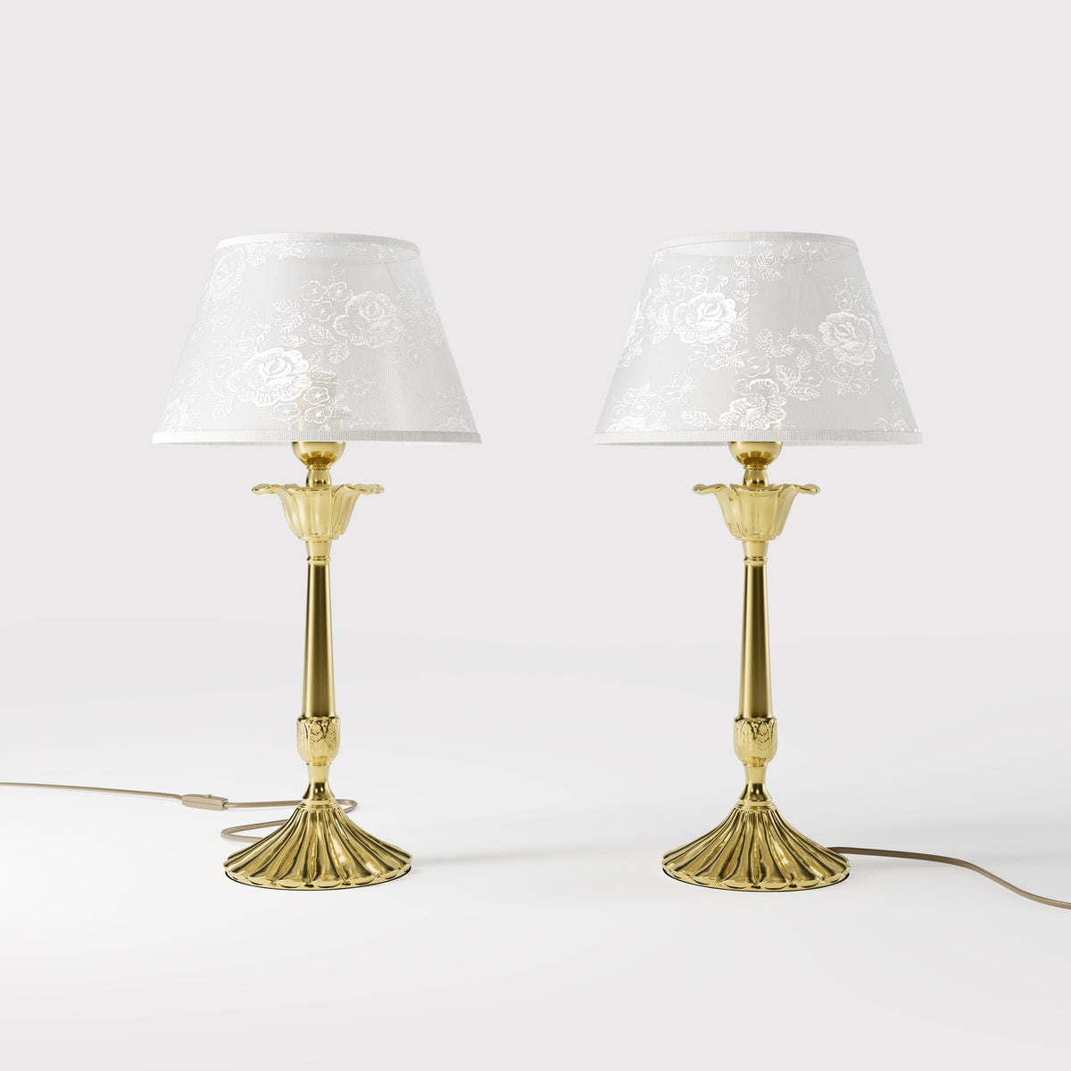 Classic brass table lamp with white fabric shade decorated with floral patterns, sculpted base with decorative elements by Ghidini 1849 - Finish: OLV Polished Brass