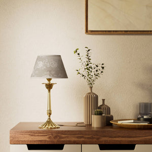 Classic brass table lamp with white fabric shade decorated with floral patterns, sculpted base with decorative elements by Ghidini 1849 - Finish: OLV Polished Brass