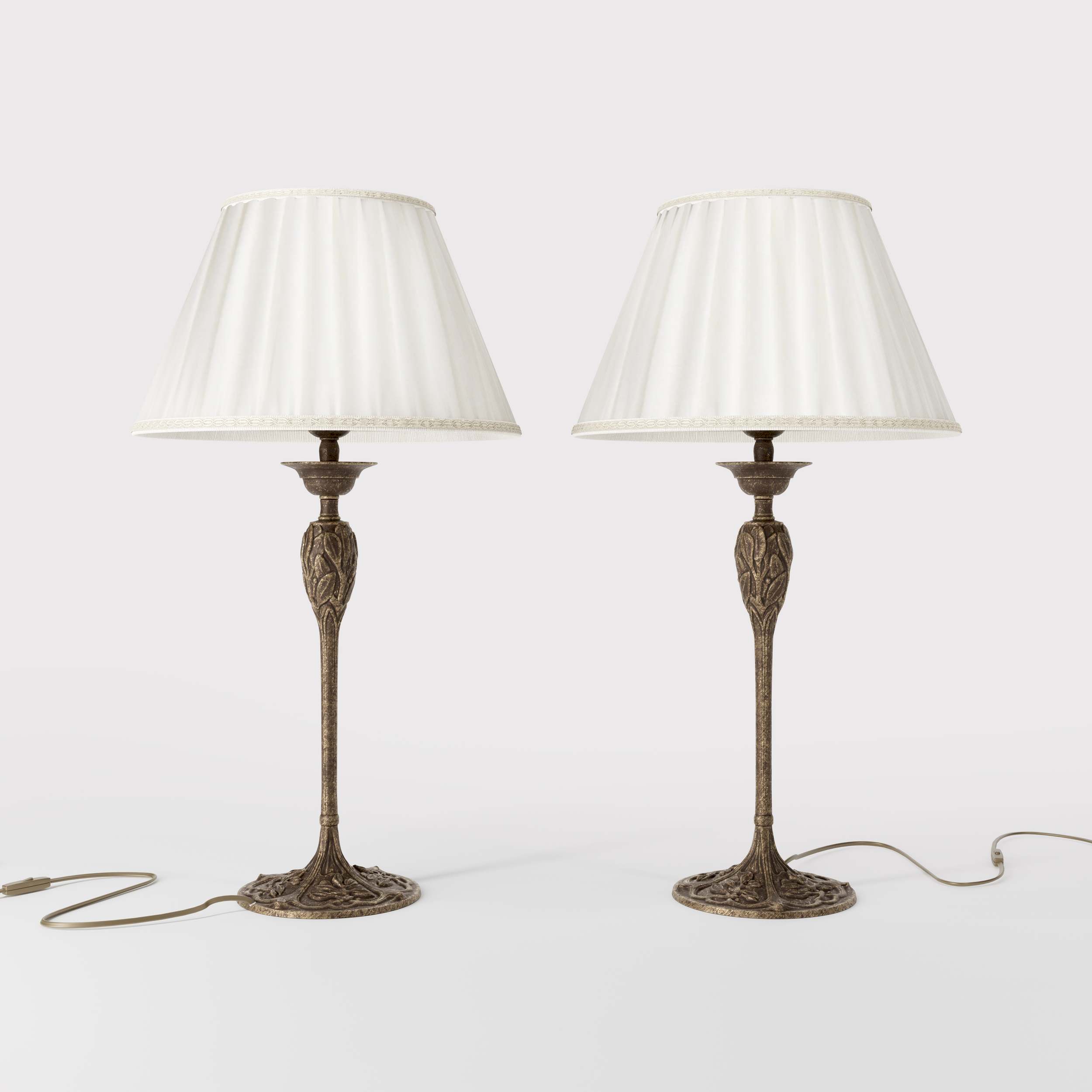 Liberty style table lamp Simona collection with decorated brass base featuring floral motifs and pleated ivory white fabric lampshade by Ghidini 1849 - Finish: OAS Antique Brass