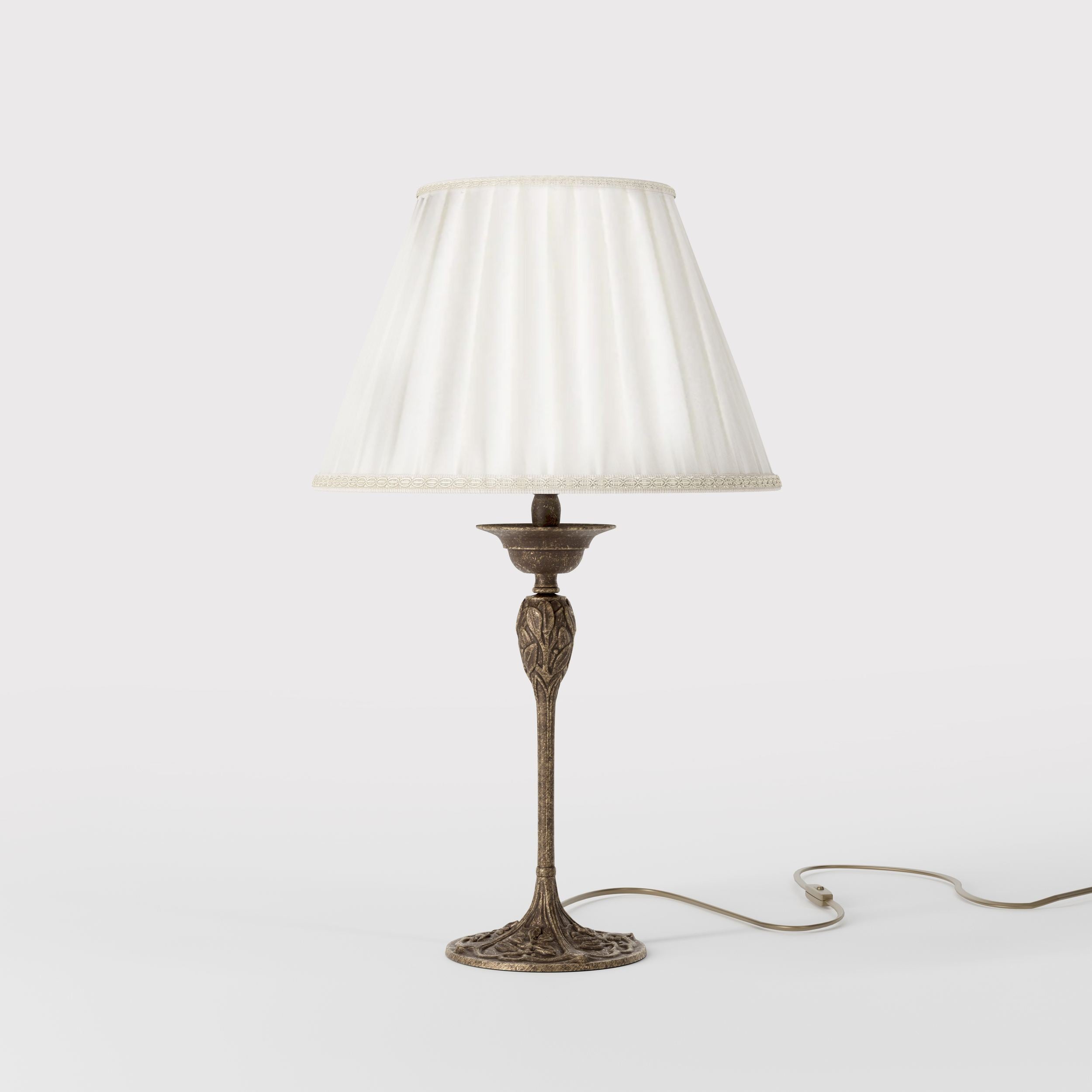 Art Nouveau table lamp Simona collection with decorated brass base featuring floral motifs and pleated ivory white fabric lampshade by Ghidini 1849 - Finish: OAS Antique Brass