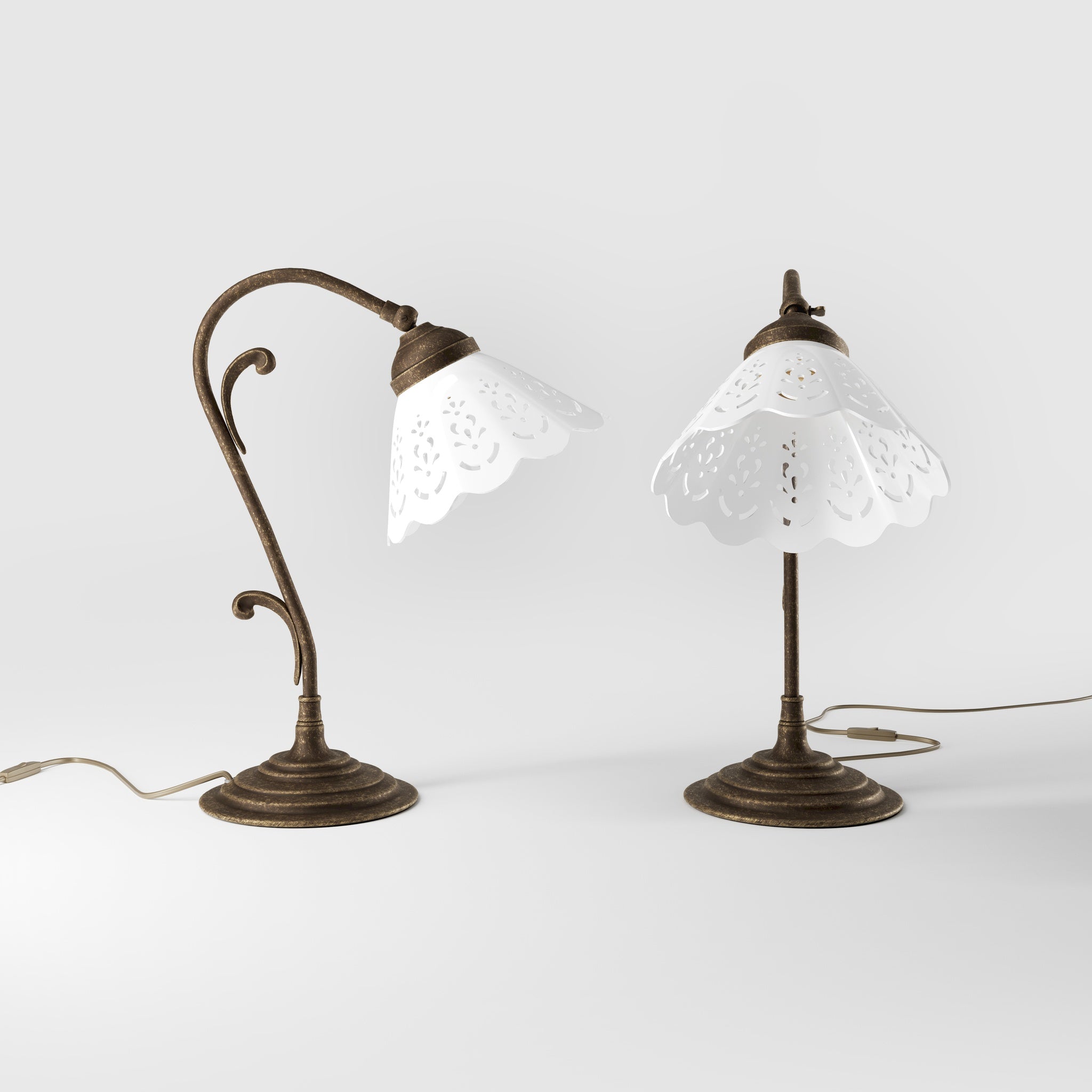 Art Nouveau table lamp with white pierced ceramic shade and decorative curved adjustable brass arm structure by Ghidini 1849 - Finish: OAS Antique Brass