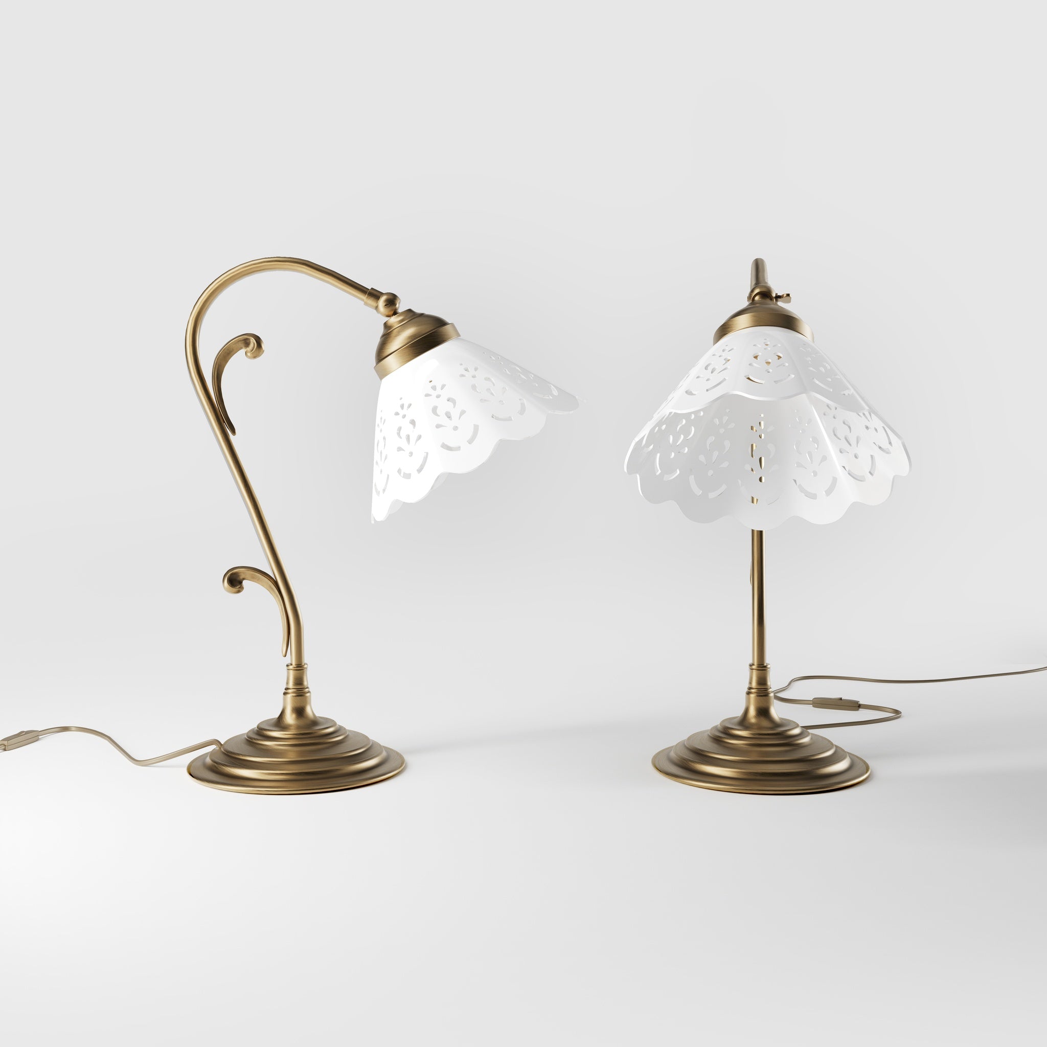 Art Nouveau table lamp with white pierced ceramic shade and decorative curved adjustable brass arm structure by Ghidini 1849 - Finish: OBS Bronze Satin Brass