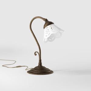 Liberty style table lamp with white pierced ceramic shade stepped base and decorative adjustable brass arm by Ghidini 1849 - Finish: OAS Antique Brass