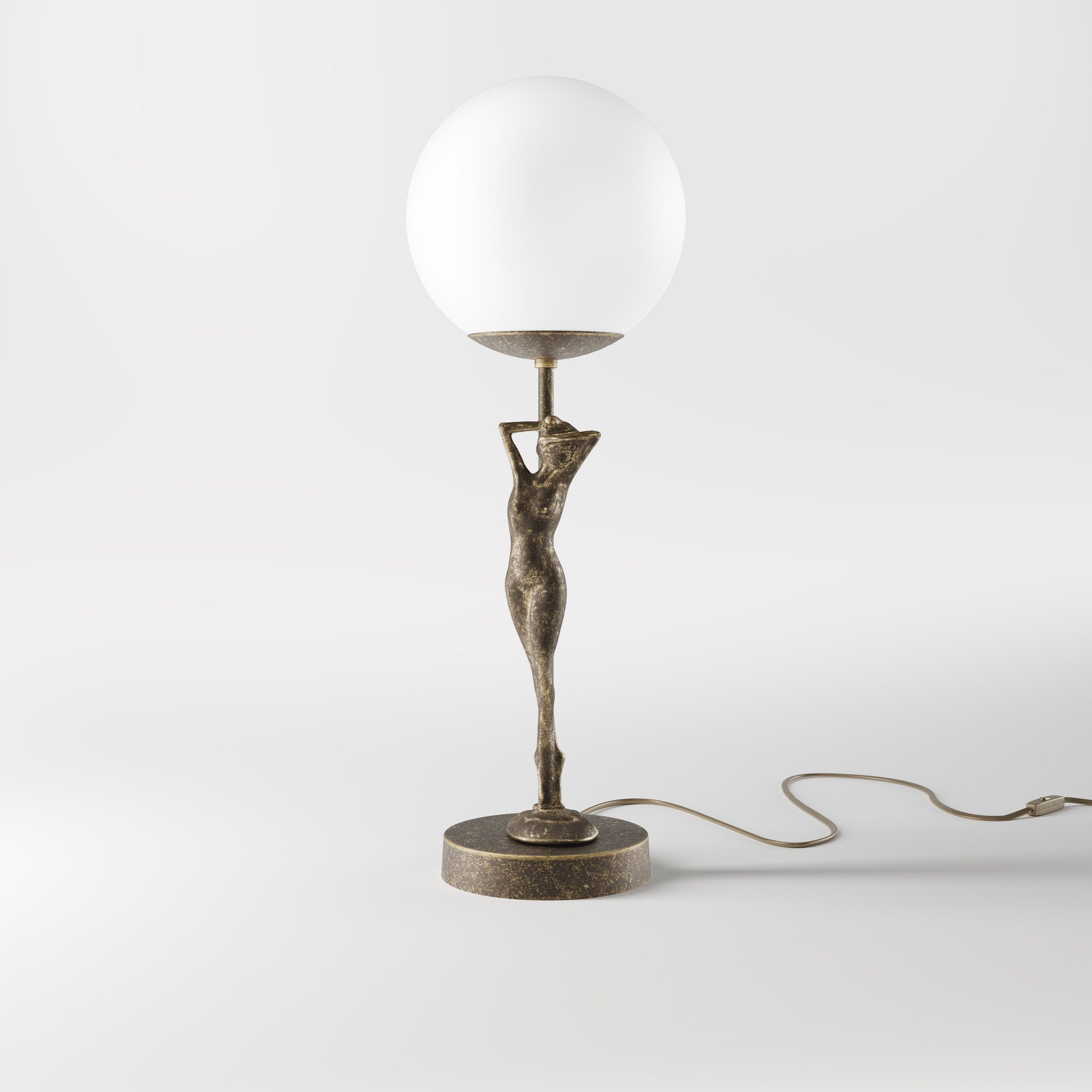 Brass table lamp with sculpted female figure and frosted glass globe, ideal for elegant interiors by Ghidini 1849 - Finish: OAS Antique Brass