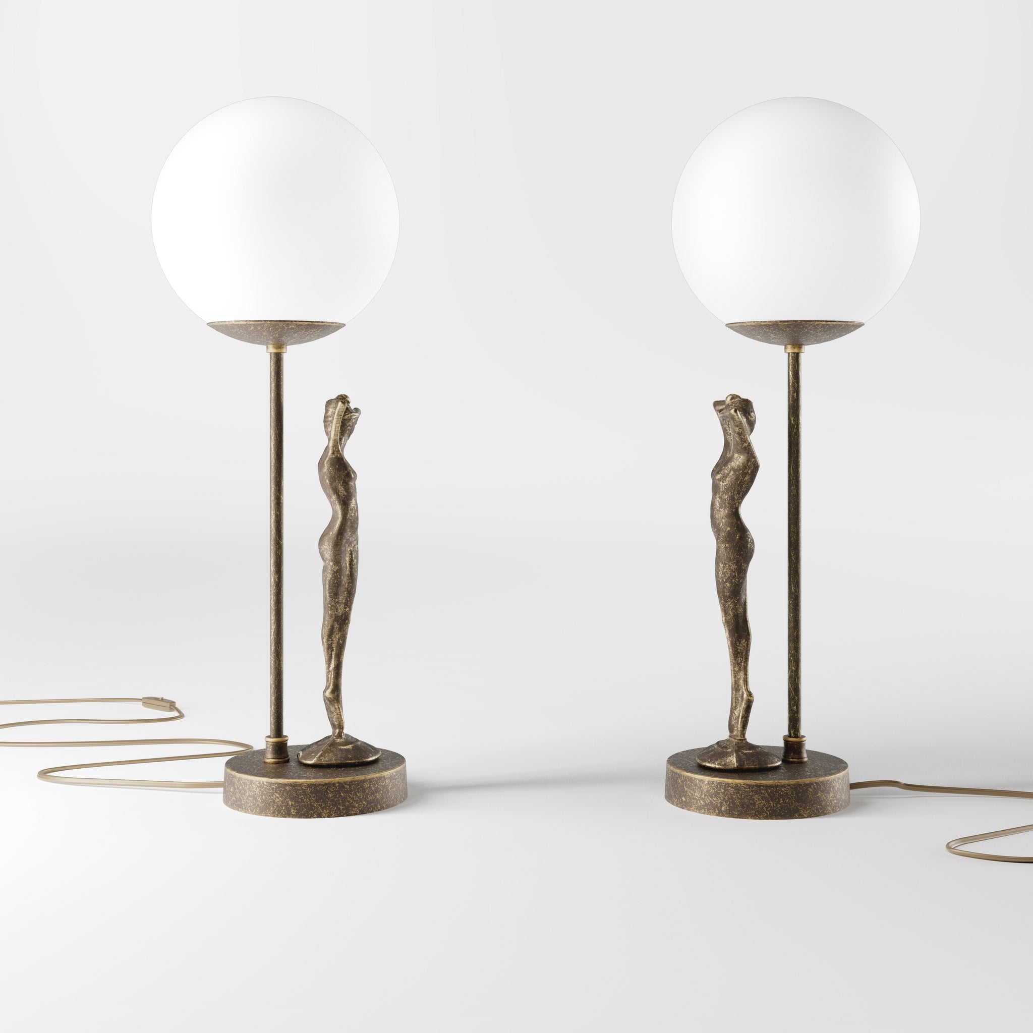 Brass table lamp with sculpted female figure and frosted glass globe, ideal for elegant interiors by Ghidini 1849 - Finish: OAS Antique Brass