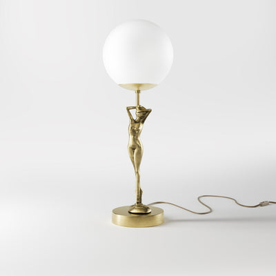 Brass table lamp with sculpted female figure and frosted glass globe, ideal for elegant interiors by Ghidini 1849 - Finish: OBV Bronze Satin Light Brass