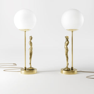 Brass table lamp with sculpted female figure and frosted glass globe, ideal for elegant interiors by Ghidini 1849 - Finish: OBV Bronze Satin Light Brass