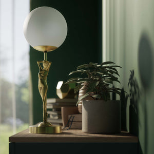 Brass table lamp with sculpted female figure and frosted glass globe, ideal for elegant interiors by Ghidini 1849 - Finish: OBV Bronze Satin Light Brass