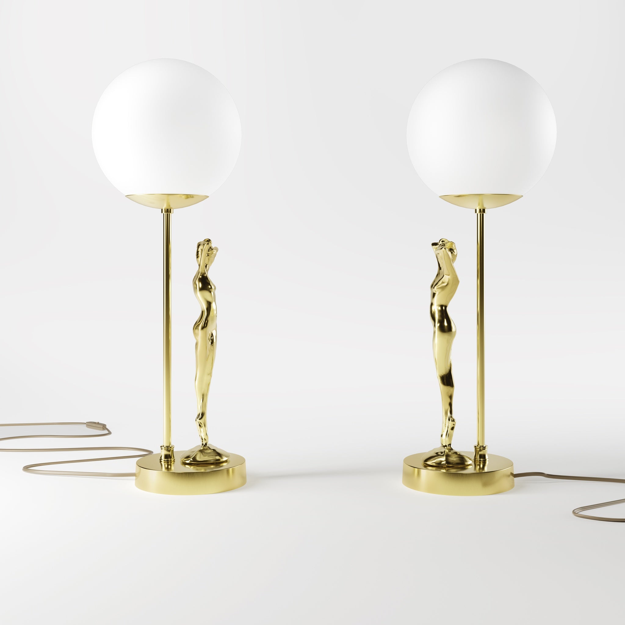 Brass table lamp with sculpted female figure and frosted glass globe, ideal for elegant interiors by Ghidini 1849 - Finish: OLV Polished Brass