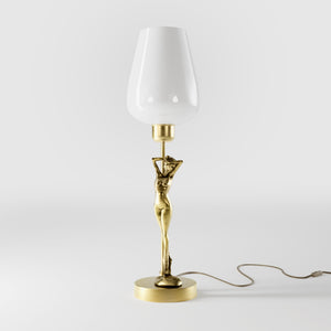 Art Deco table lamp with sculptural brass female figure and conical glossy white glass shade, decorative base by Ghidini 1849 - Finish: OBV Bronze Satin Light Brass