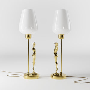 Art Deco table lamp with sculptural brass female figure and conical glossy white glass shade, decorative base by Ghidini 1849 - Finish: OLV Polished Brass