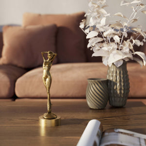 Art Deco decorative statue with dancing brass female figure, elegant pose and minimalist circular base by Ghidini 1849 - Finish: OBS Bronze Satin Brass