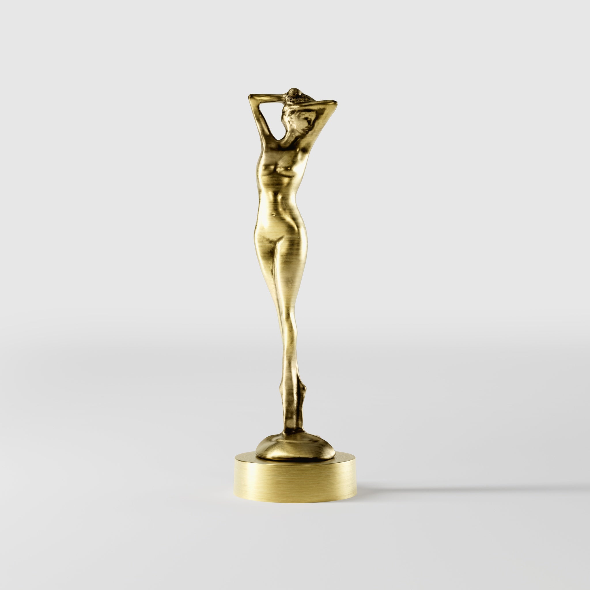 Art Deco decorative statue with dancing brass female figure, elegant pose and minimalist circular base by Ghidini 1849 - Finish: OBV Bronze Satin Light Brass