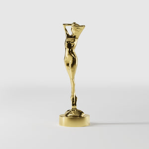 Art Deco decorative statue with dancing brass female figure, elegant pose and minimalist circular base by Ghidini 1849 - Finish: OLV Polished Brass