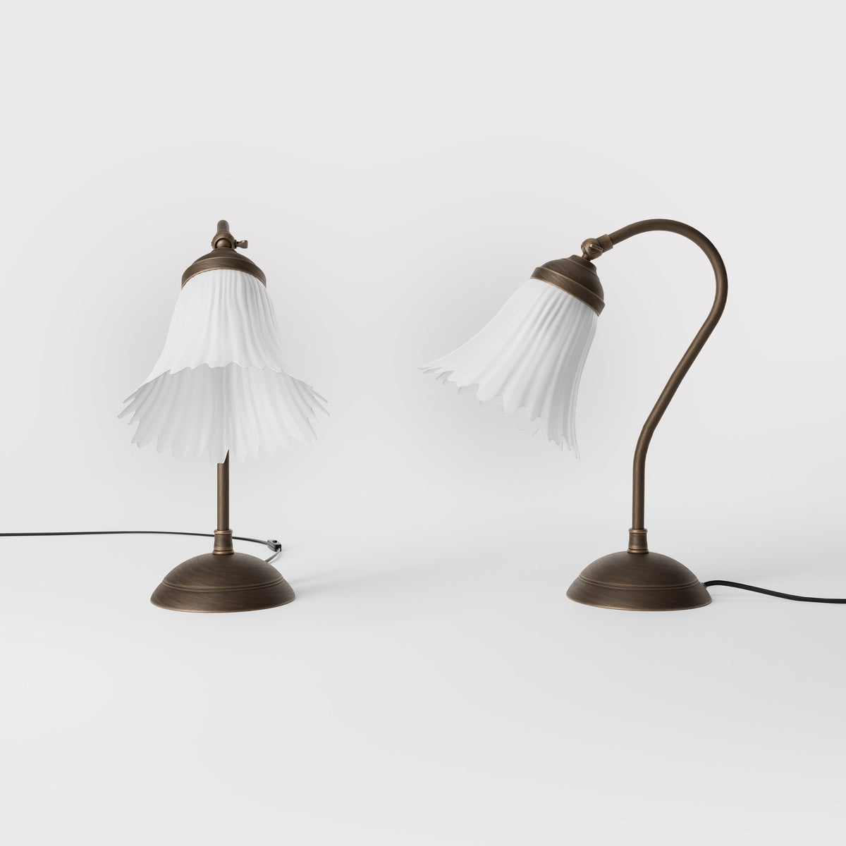 Table lamp with adjustable brass arm and wavy frosted glass shade, round base, classic Italian design by Ghidini 1849 - Finish: OBM Bronze Satin Matt Brass