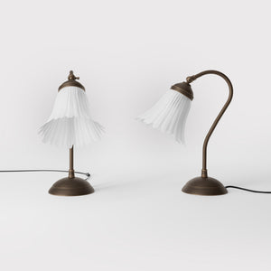 Table lamp with adjustable brass arm and wavy frosted glass shade, round base, classic Italian design by Ghidini 1849 - Finish: OBM Bronze Satin Matt Brass