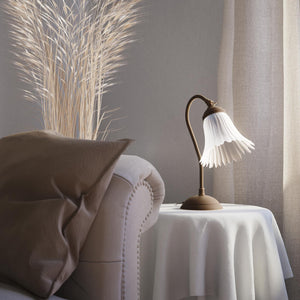 Table lamp with adjustable brass arm and wavy frosted glass shade, round base, classic Italian design by Ghidini 1849 - Finish: OBM Bronze Satin Matt Brass