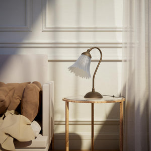 Table lamp with adjustable brass arm and wavy frosted glass shade, round base, classic Italian design by Ghidini 1849 - Finish: OBM Bronze Satin Matt Brass