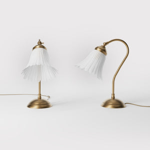 Table lamp with adjustable brass arm and wavy frosted glass shade, round base, classic Italian design by Ghidini 1849 - Finish: OBS Bronze Satin Brass