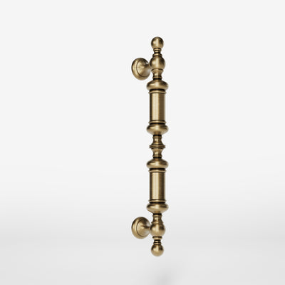 Classic brass door handle with turned details, suitable for interior and exterior use by Ghidini 1849 - Finish: OBS Bronze Satin Brass