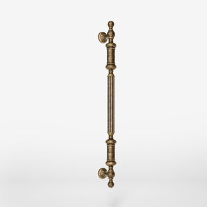 Neoclassical brass pull handle with fluted details, ideal for interior and exterior doors by Ghidini 1849 - Finish: OAS Antique Brass