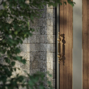 Brass pull handle with baroque details, fluted sections, and sculpted elements, perfect for luxury entrances by Ghidini 1849 - Finish: OBS Bronze Satin Brass