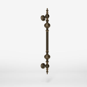 Brass pull handle with sculpted details and elegant proportions, ideal for refined doors by Ghidini 1849 - Finish: OBM Bronze Satin Matt Brass