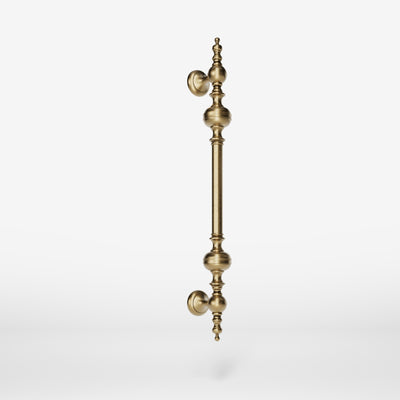 Brass pull handle with sculpted details and elegant proportions, ideal for refined doors by Ghidini 1849 - Finish: OBS Bronze Satin Brass