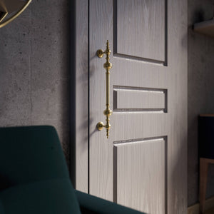 Brass pull handle with sculpted details and elegant proportions, ideal for refined doors by Ghidini 1849 - Finish: OBV Bronze Satin Light Brass