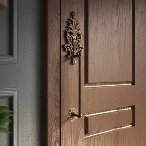 Brass pull handle with floral engravings and decorative details, perfect for luxury entrances by Ghidini 1849 - Finish: OAS Antique Brass