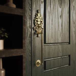 Brass pull handle with floral engravings and decorative details, perfect for luxury entrances by Ghidini 1849 - Finish: OLV Polished Brass