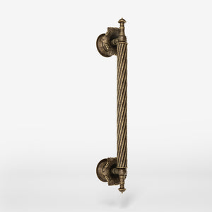 Brass pull handle with corded shaft and decorative details, perfect for luxury doors and elegant entrances by Ghidini 1849 - Finish: OAS Antique Brass