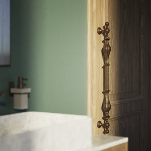 Brass pull handle with refined lines and sculpted details, suitable for single or bilateral installation on classic doors by Ghidini 1849 - Finish: OAS Antique Brass