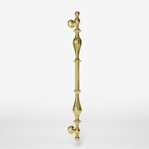 Brass pull handle with refined lines and sculpted details, suitable for single or bilateral installation on classic doors by Ghidini 1849 - Finish: OLV Polished Brass