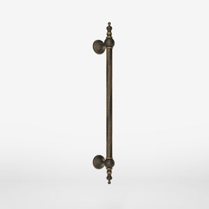 Elegant brass pull handle with decorative motifs, ideal for prestigious doors by Ghidini 1849 - Finish: OBM Bronze Satin Matt Brass