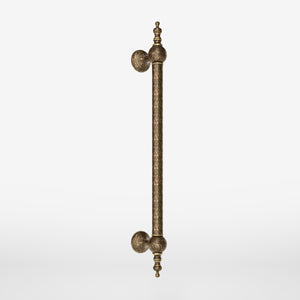 Decorative brass pull handle for high-end doors with turned details and classic craftsmanship, Made in Italy by Ghidini 1849 - Finish: OAS Antique Brass