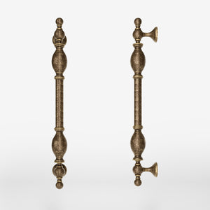 Decorative brass pull handle with classic turned details for elegant entrances and doors by Ghidini 1849 - Finish: OAS Antique Brass