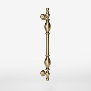 Decorative brass pull handle with classic turned details for elegant entrances and doors by Ghidini 1849 - Finish: OBS Bronze Satin Brass