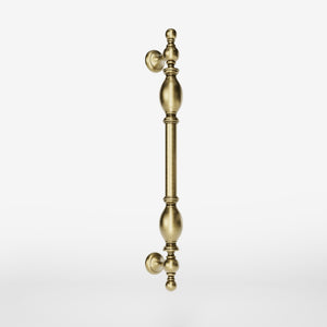 Decorative brass pull handle with classic turned details for elegant entrances and doors by Ghidini 1849 - Finish: OBV Bronze Satin Light Brass