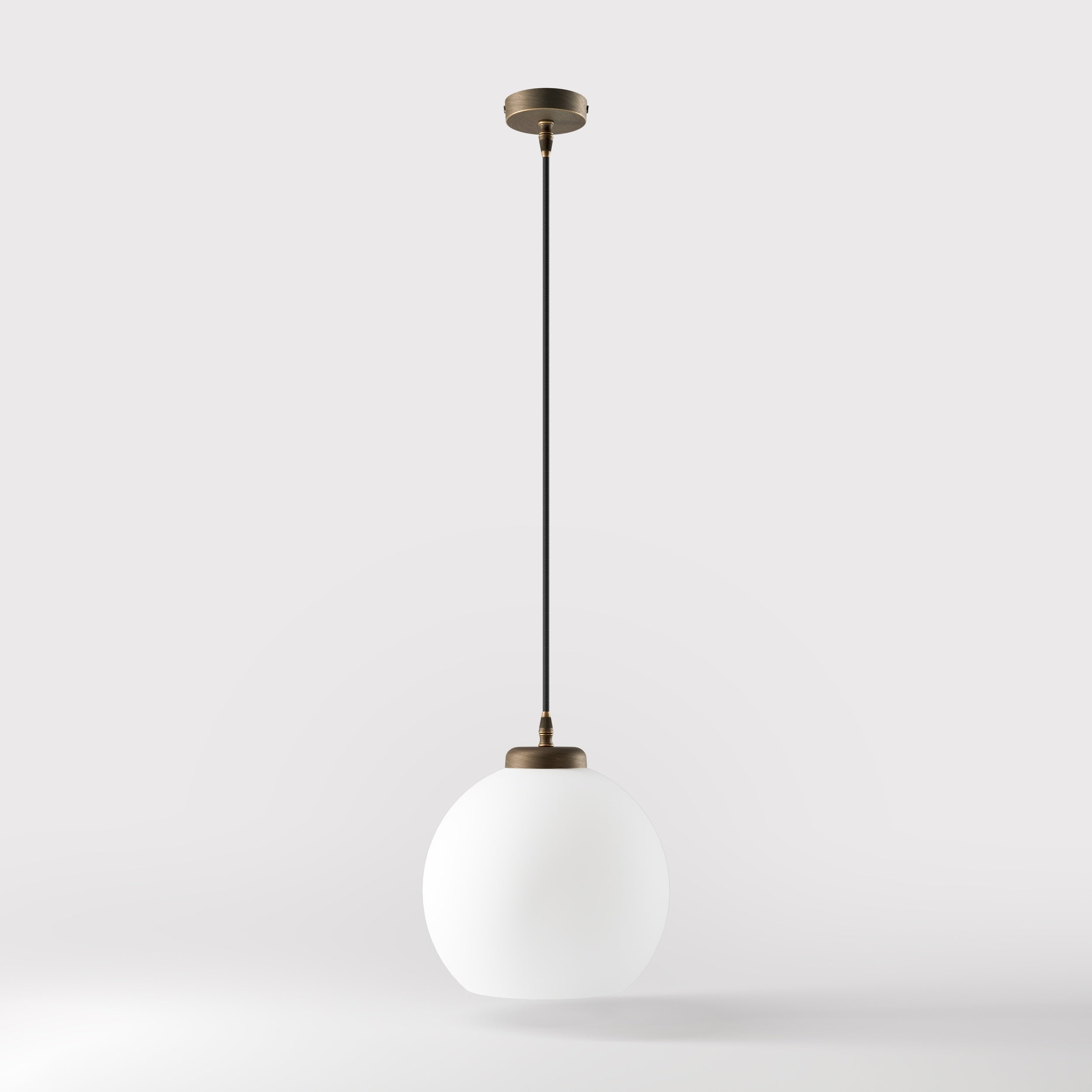 Pendant lamp with opal glass globe, diffused lighting and contemporary design for stylish interiors - Finish: OBM Bronze Satin Matt Brass