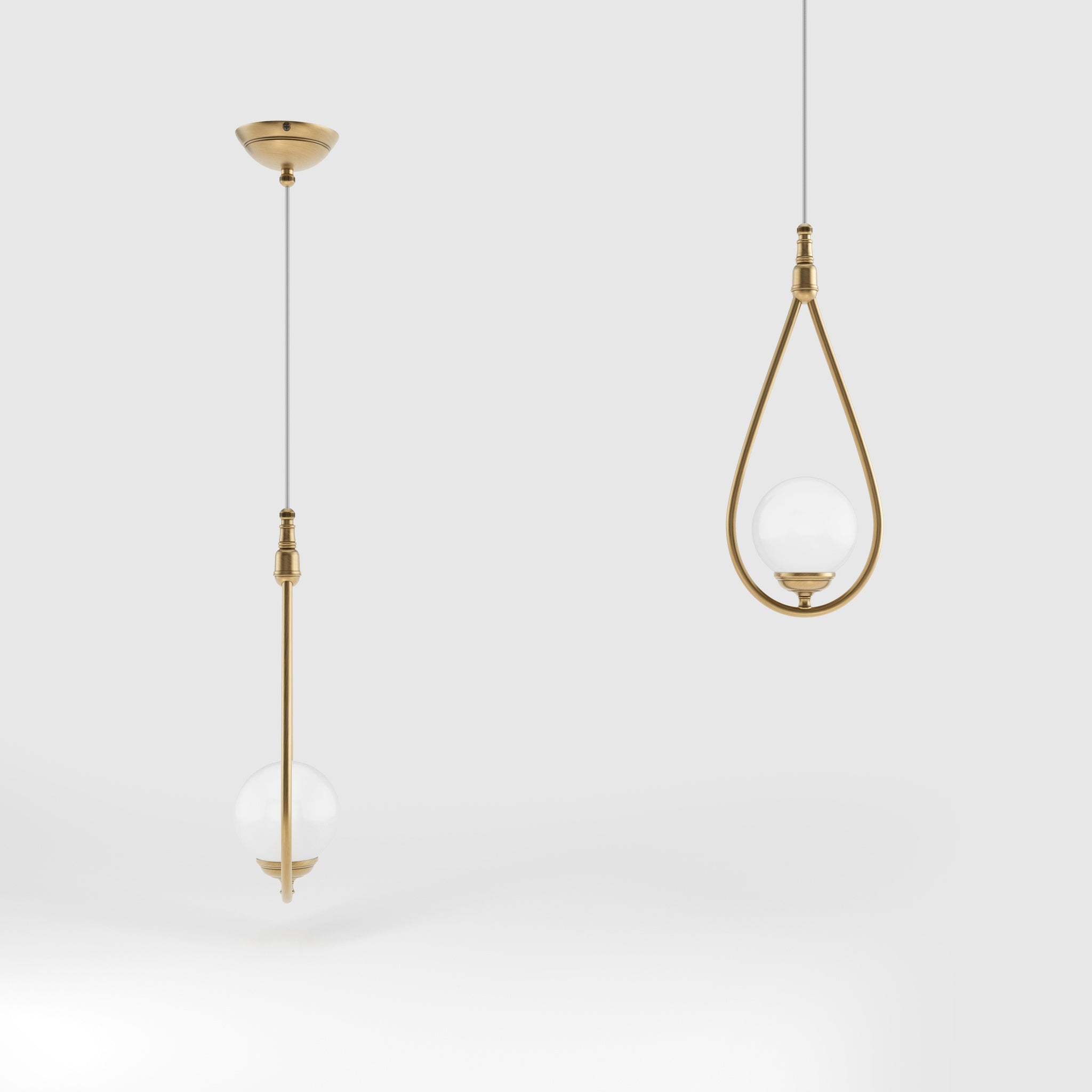 Art Deco teardrop pendant light in brass with glossy white glass sphere adjustable cable elegant design lighting decor by Ghidini 1849 - Finish: OBS Bronze Satin Brass