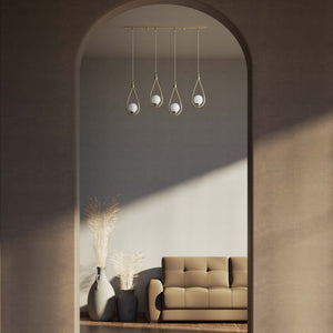 Art Deco multiple pendant with 4 brass teardrops and glossy white glass spheres adjustable cables elegant design by Ghidini 1849 - Finish: OBV Bronze Satin Light Brass