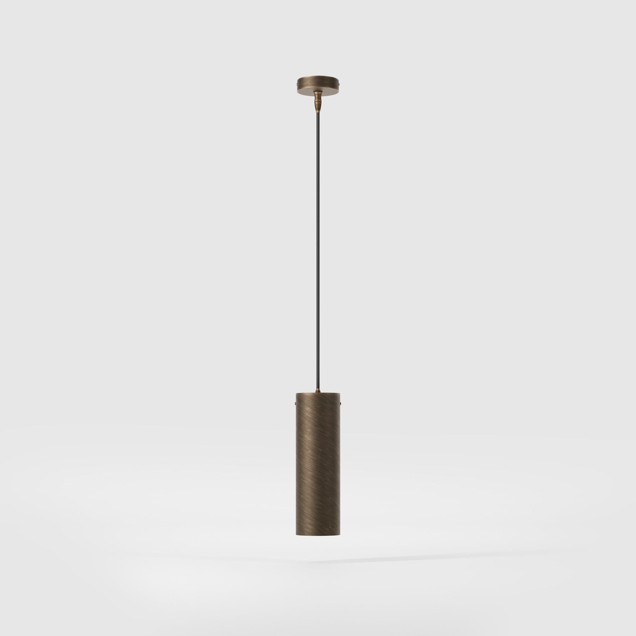Brass pendant light minimal design cylindrical black textile cable modern interior lighting Made in Italy by Ghidini 1849 - Finish: OBM Bronze Satin Matt Brass
