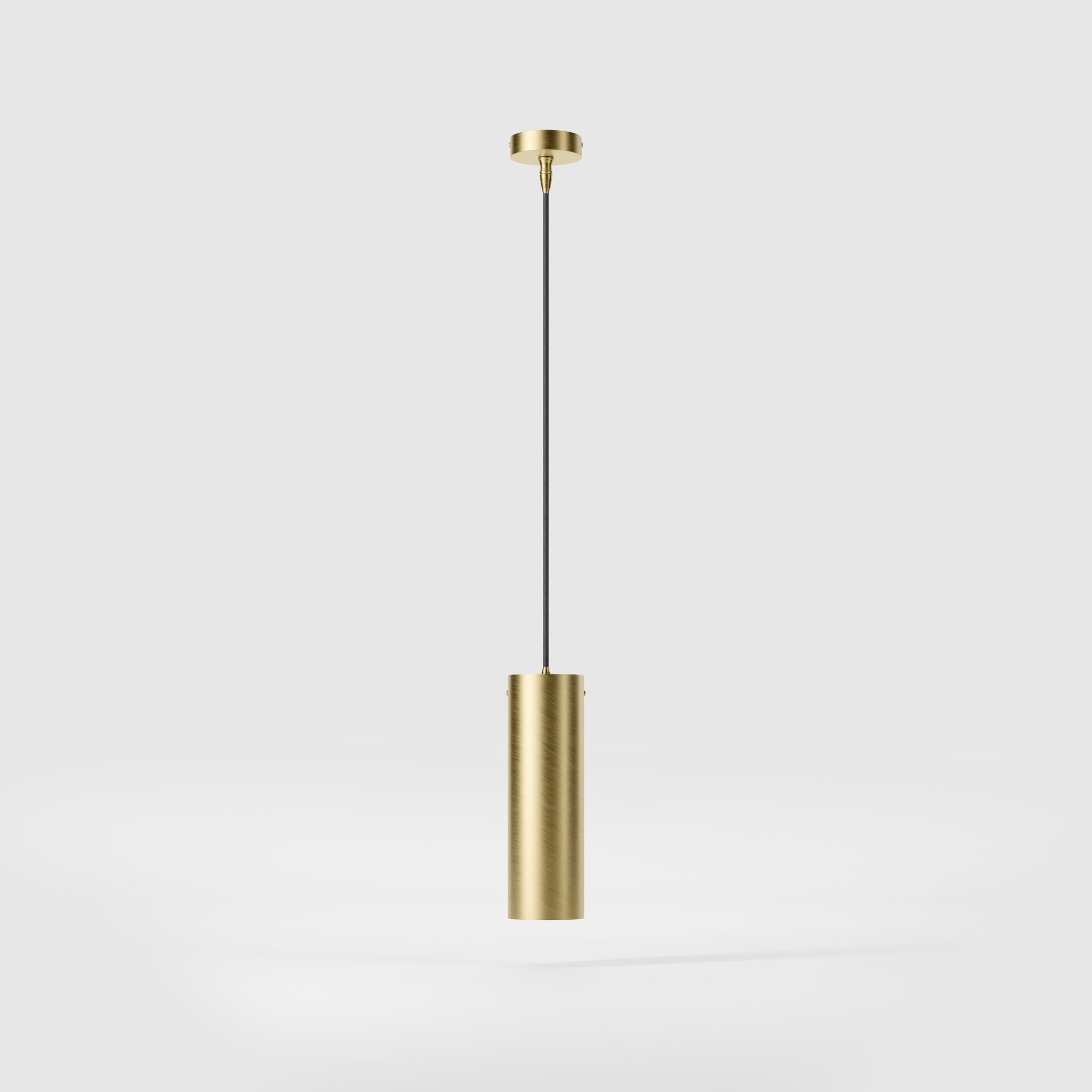 Brass pendant light minimal design cylindrical black textile cable modern interior lighting Made in Italy by Ghidini 1849 - Finish: OBV Bronze Satin Light Brass