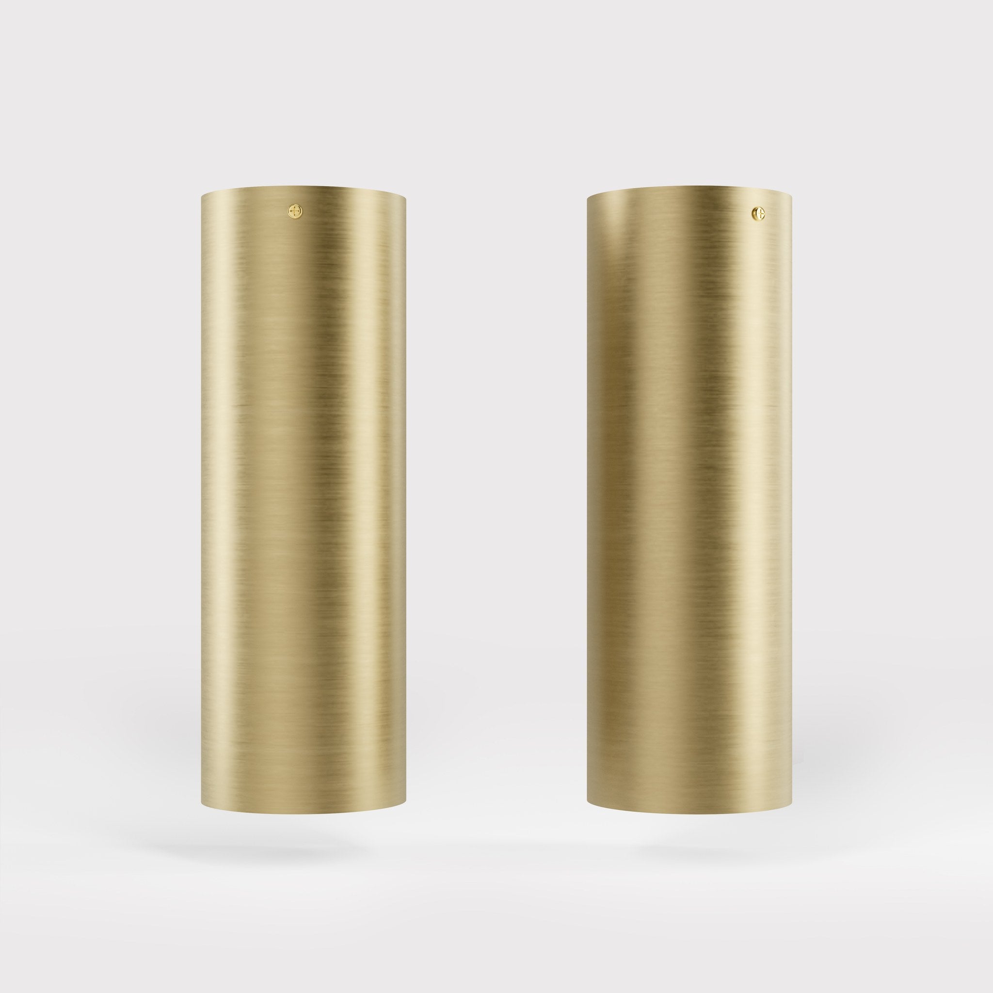 Cylindrical ceiling lamp in brass Venere installed in a contemporary hallway interior by Ghidini 1849 - Finish: OBV Bronze Satin Light Brass