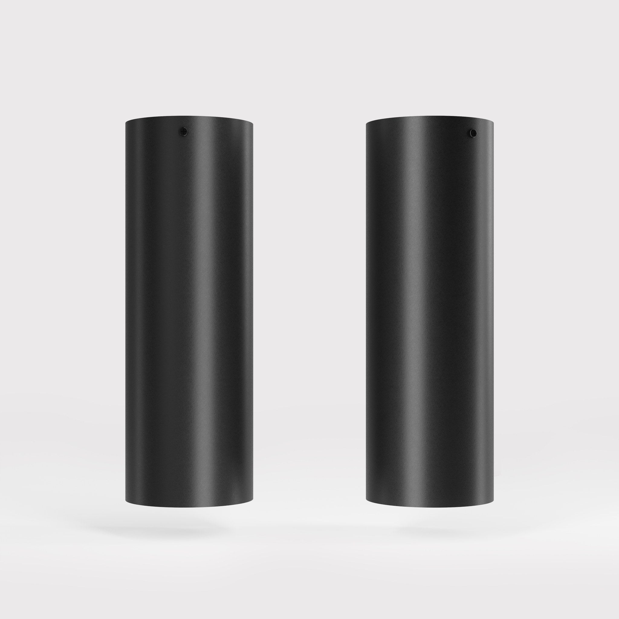 Cylindrical ceiling lamp in brass Venere installed in a contemporary hallway interior by Ghidini 1849 - Finish: ONO Matt Black
