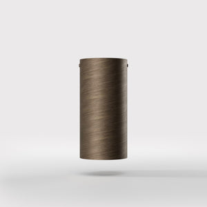 Cylinder ceiling lamp in brass with compact body installed on the ceiling of an elegant corridor by Ghidini 1849 - Finish: OBM Bronze Satin Matt Brass