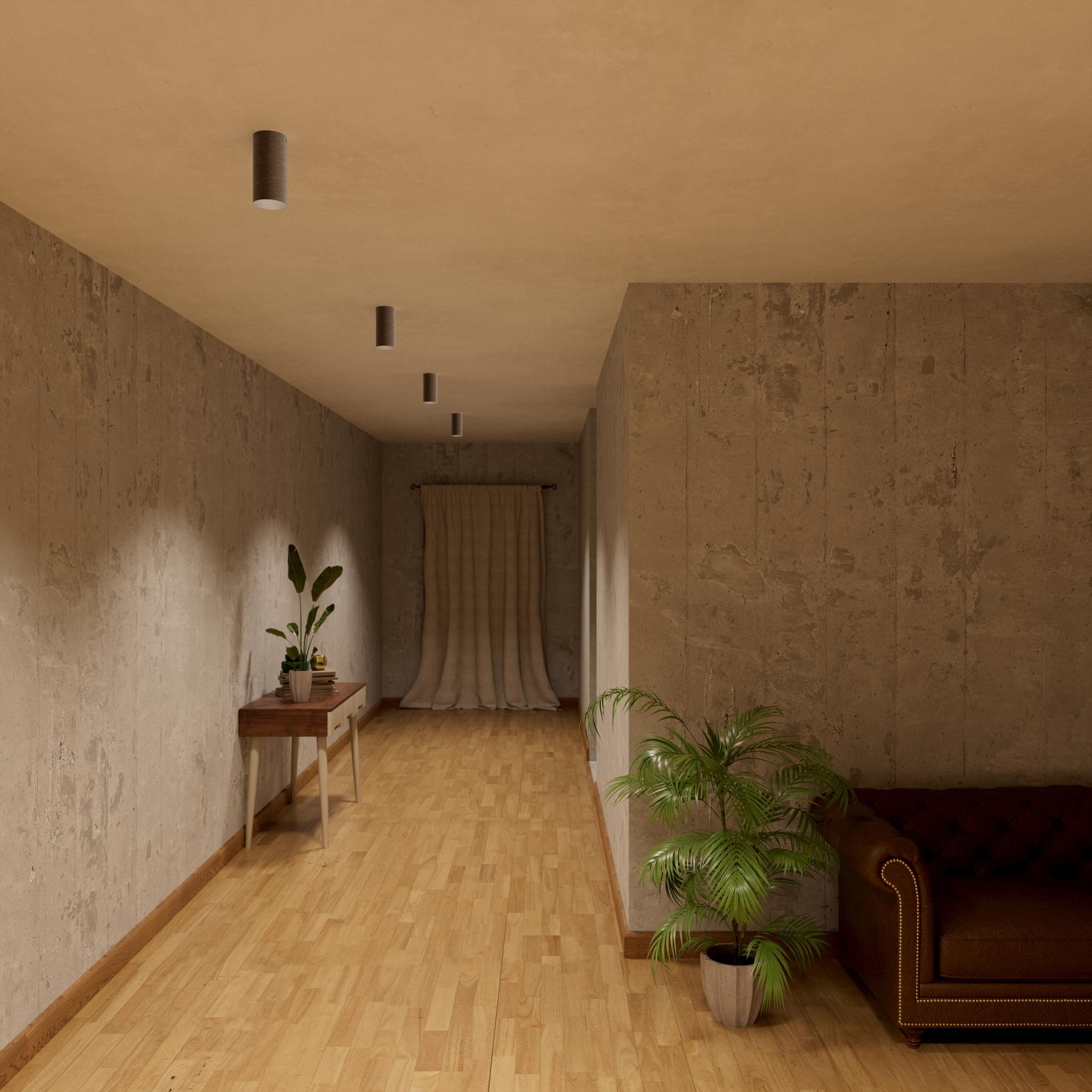 Cylinder ceiling lamp in brass with compact body installed on the ceiling of an elegant corridor by Ghidini 1849 - Finish: OBM Bronze Satin Matt Brass