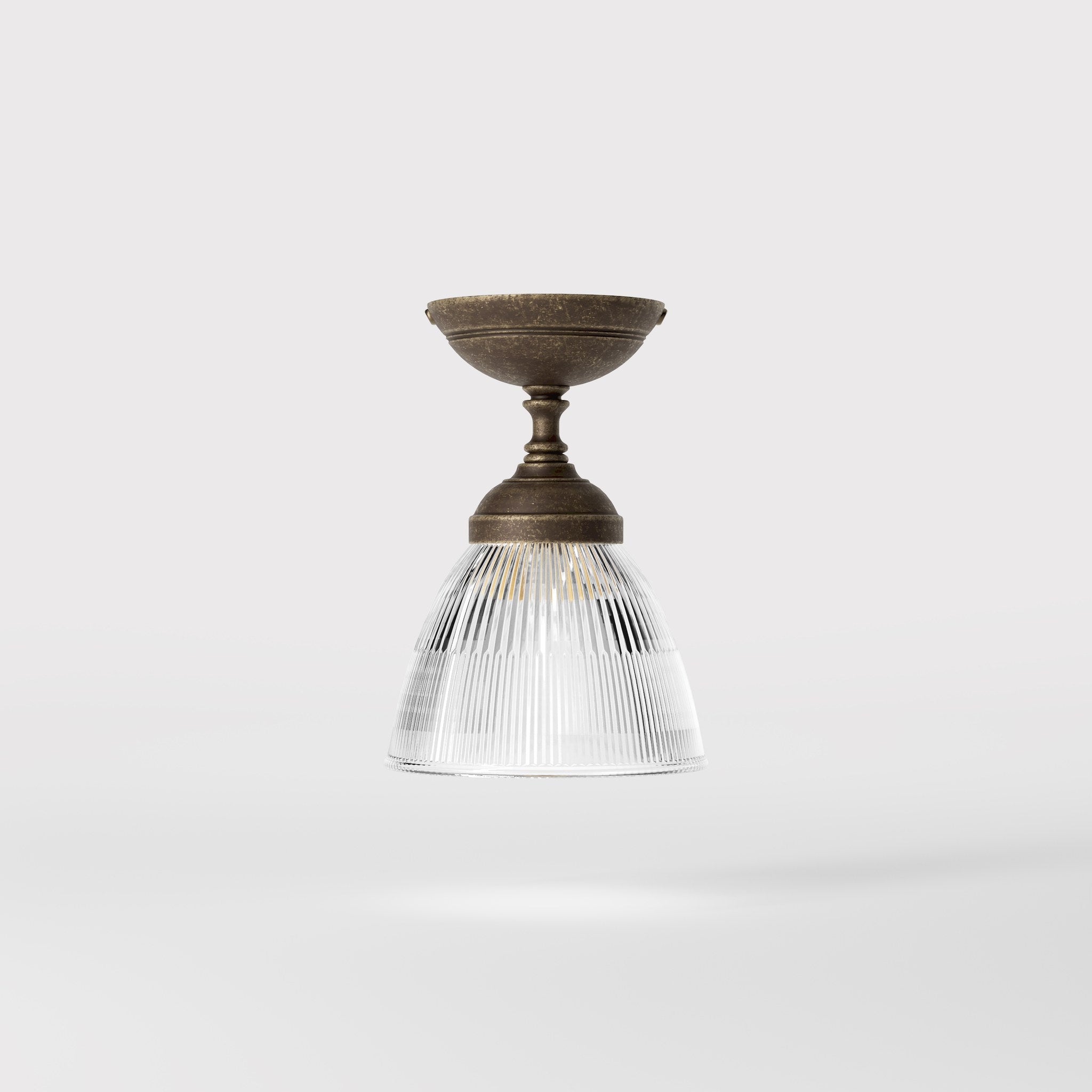 Classic ceiling lamp in brass with a clear conical ribbed glass shade from the Elide range by Ghidini 1849 - Finish: OAS Antique Brass